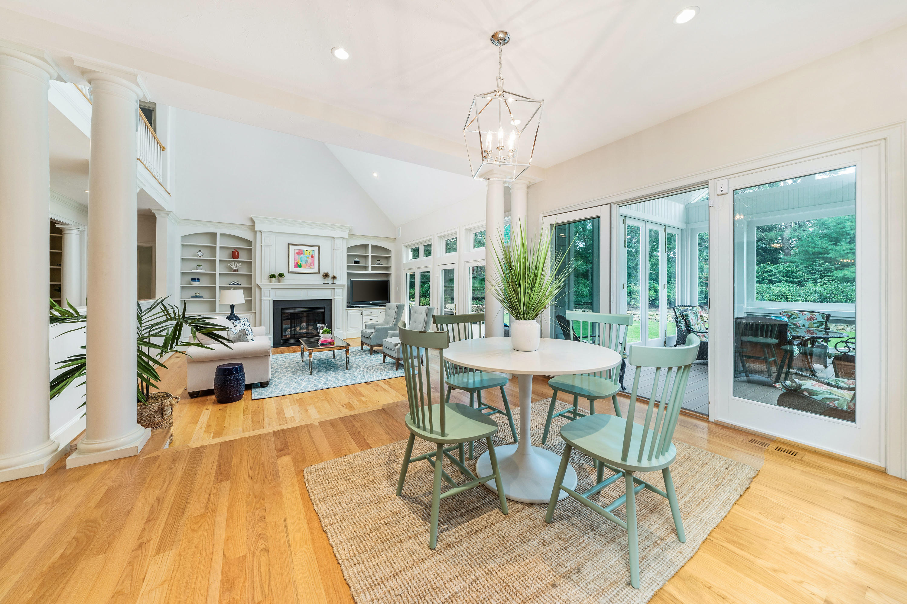87 Seapuit Road Osterville, MA 02655 - Photo 10 of 39 a view of a dining room with furniture wooden floor and chandelier