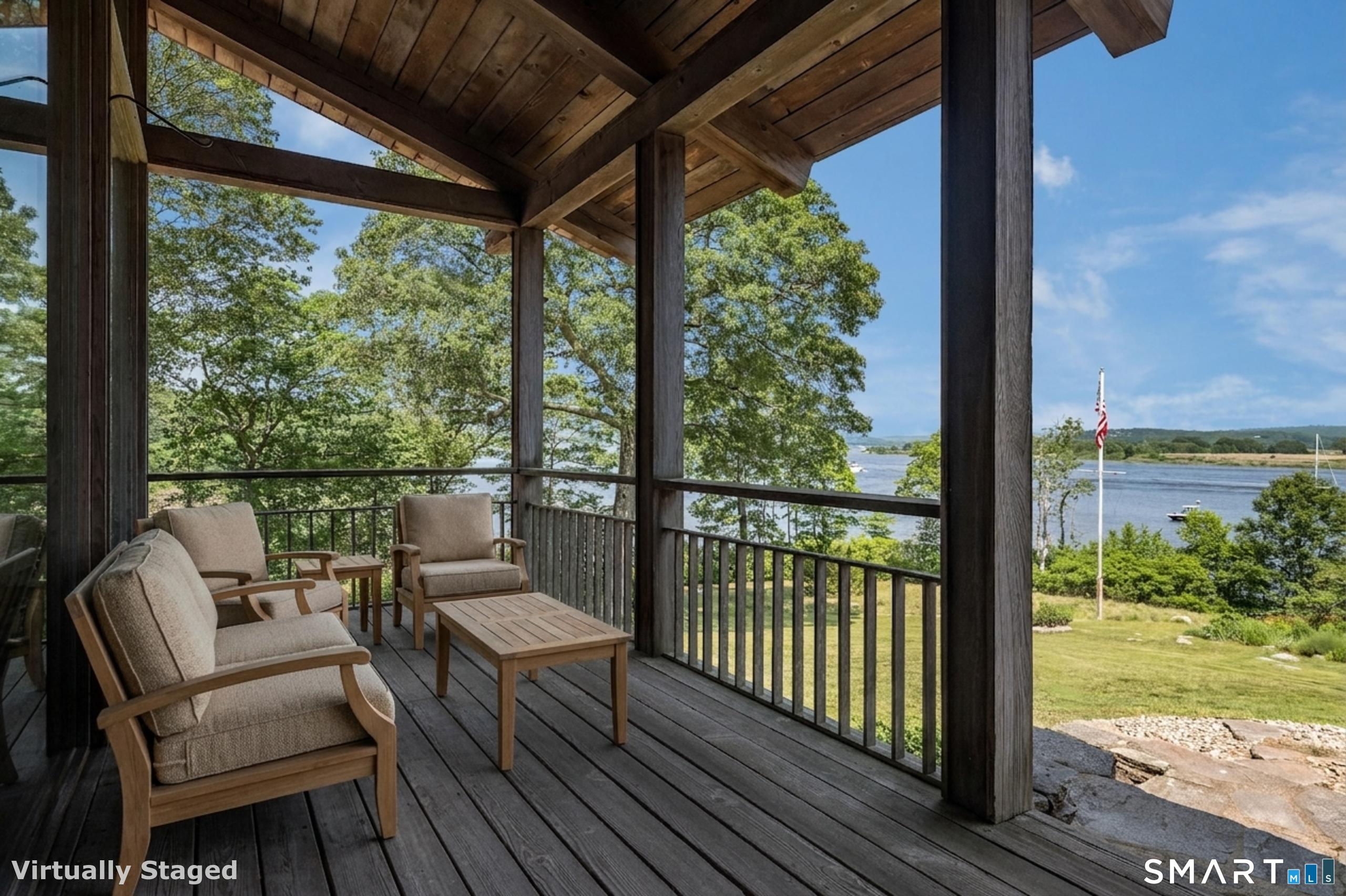 41 Watrous Point Road Old Saybrook, CT 06475 - Photo 12 of 40 a view of a balcony with lake view and a ocean view
