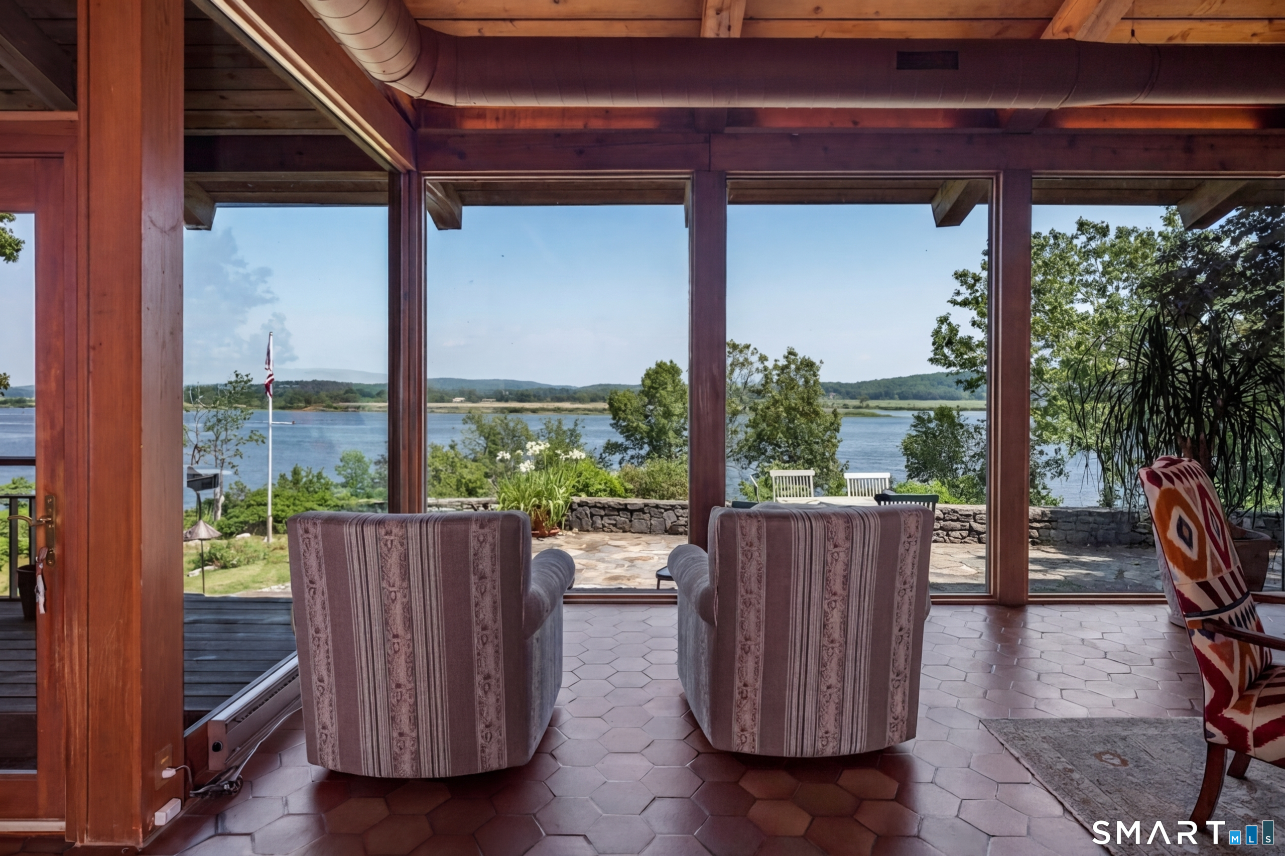 41 Watrous Point Road Old Saybrook, CT 06475 - Photo 16 of 40 a view of balcony with wooden floor