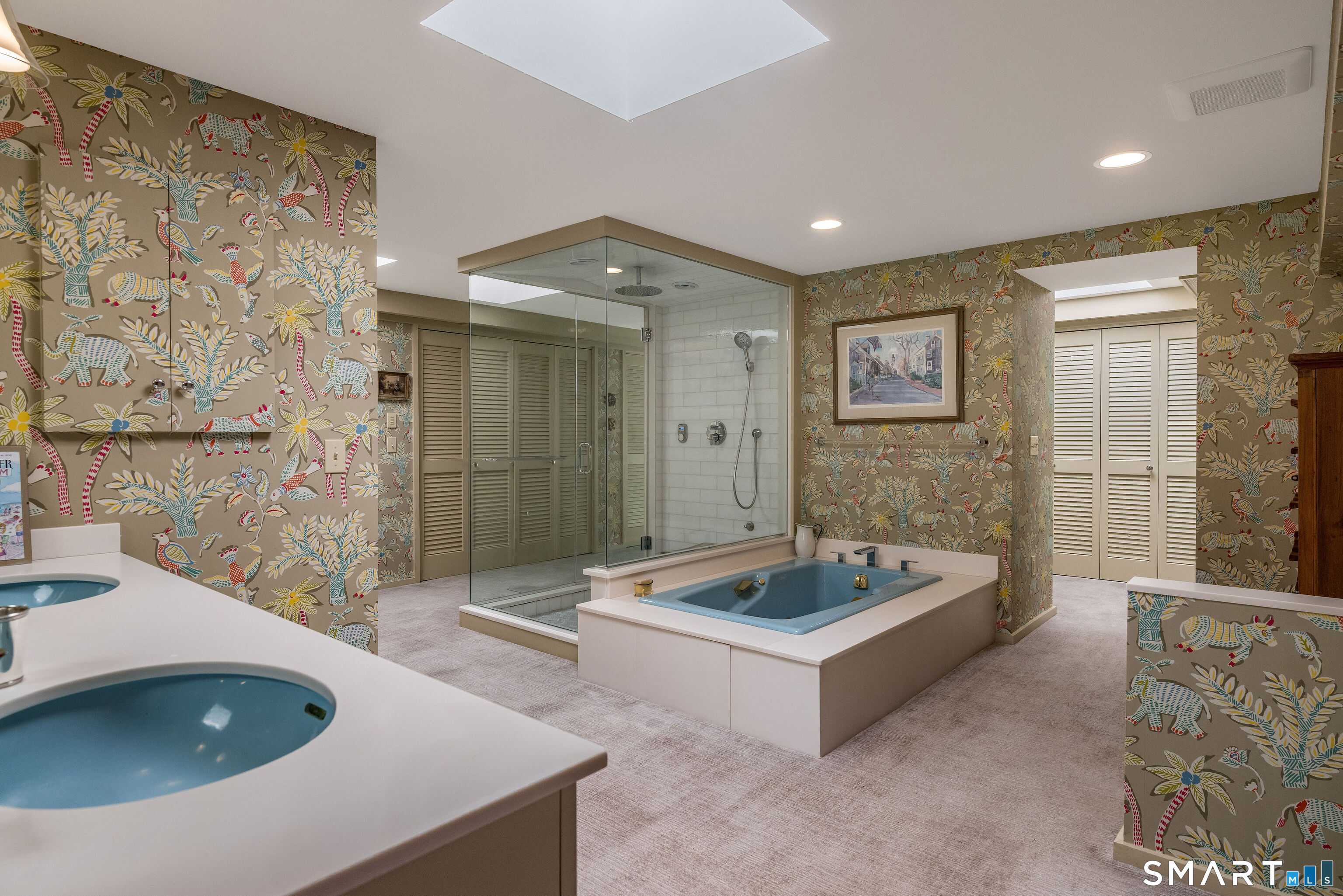 41 Watrous Point Road Old Saybrook, CT 06475 - Photo 28 of 40 a spacious bathroom with a tub a sink and glass door