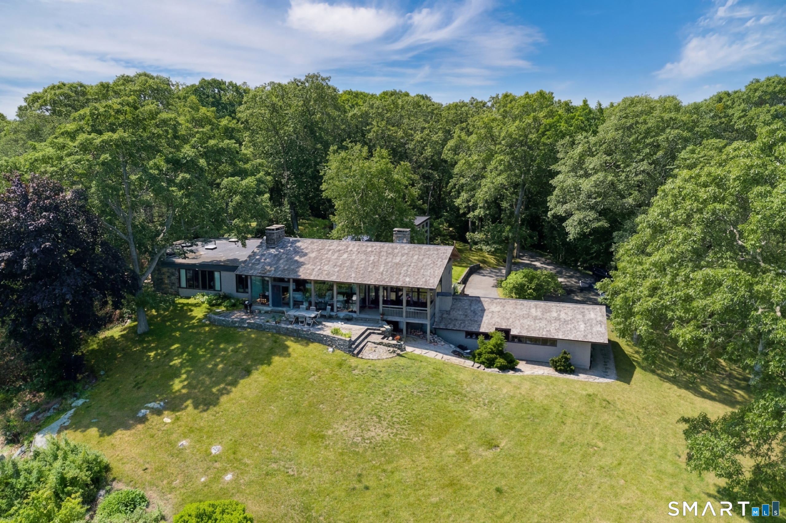 41 Watrous Point Road Old Saybrook, CT 06475 - Photo 8 of 40 an aerial view of a house with swimming pool and garden
