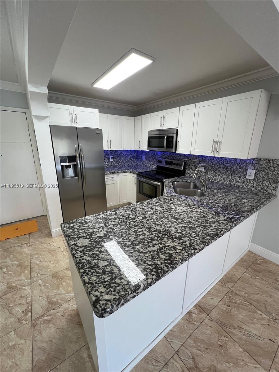 1075 West 68th Street, Unit 218 Hialeah, FL 33014 - Photo 2 of 24