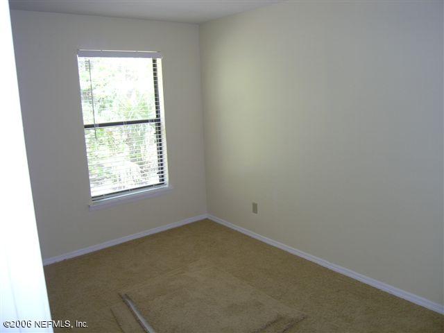 100 Cat Road Ponte Vedra Beach, FL 32082 - Photo 12 of 14 an empty room with a window