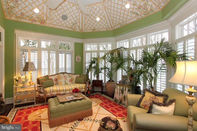 7402 Fairfax Road Bethesda, MD 20814 - Photo 12 of 30 a living room with furniture and a large window