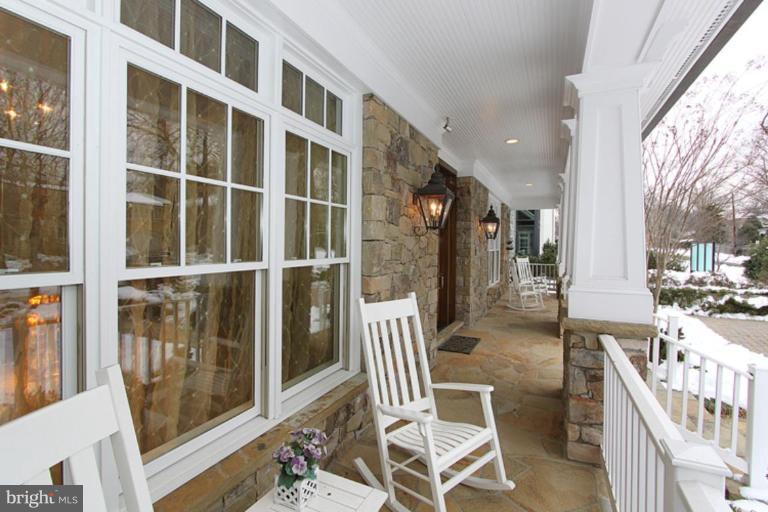 7402 Fairfax Road Bethesda, MD 20814 - Photo 23 of 30 a view of a balcony with chairs