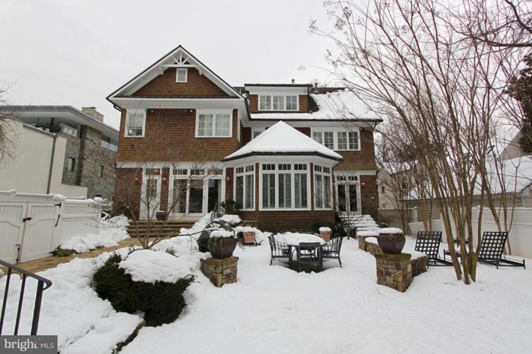 7402 Fairfax Road Bethesda, MD 20814 - Photo 25 of 30 a front view of a house with patio
