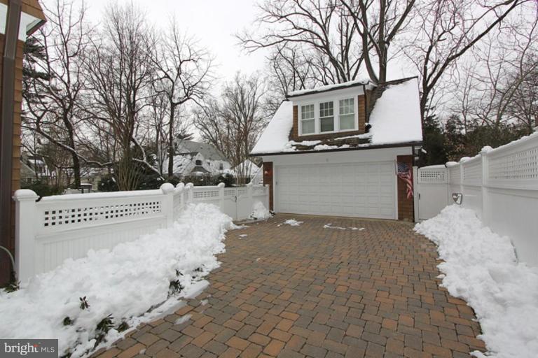7402 Fairfax Road Bethesda, MD 20814 - Photo 26 of 30 a view of a house with a yard and garage