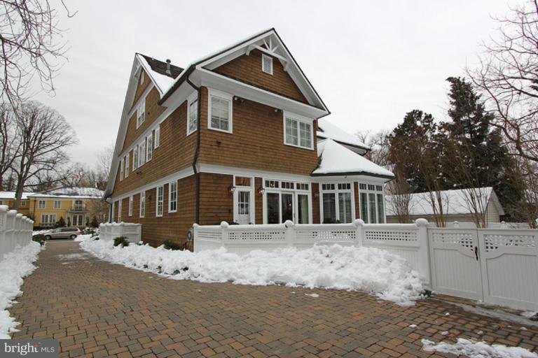 7402 Fairfax Road Bethesda, MD 20814 - Photo 27 of 30 a front view of a house with a yard