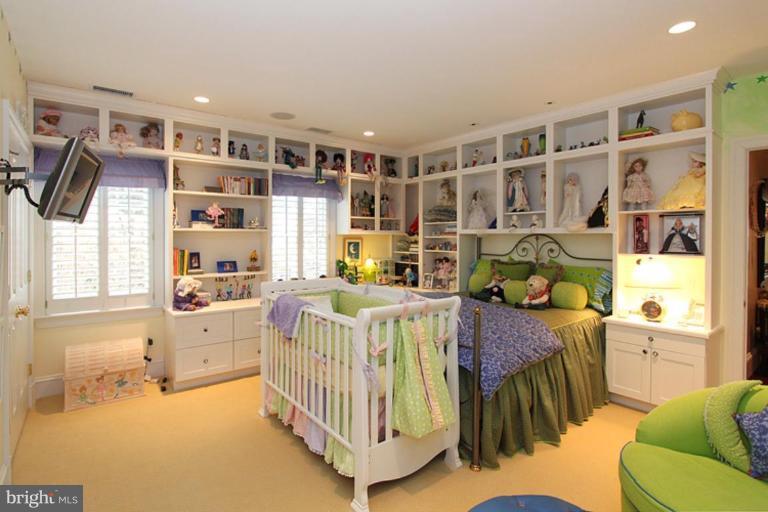 7402 Fairfax Road Bethesda, MD 20814 - Photo 28 of 30 a bedroom with furniture and a window