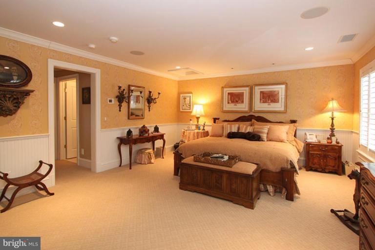 7402 Fairfax Road Bethesda, MD 20814 - Photo 29 of 30 a spacious bedroom with a bed and window