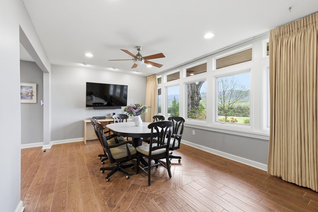 6203 Airport Road Andrews, NC 28901 - Photo 8 of 50 a view of a dining room with furniture window and wooden floor