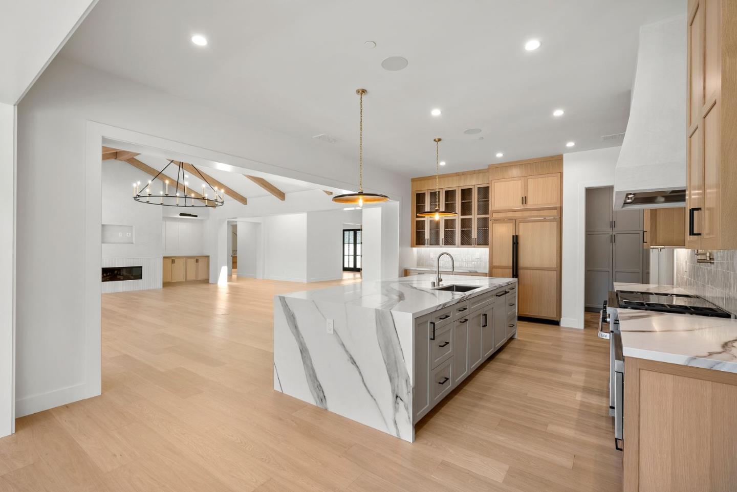 18521 Vessing Road Saratoga, CA 95070 - Photo 12 of 36 a large white kitchen with a lot of counter space