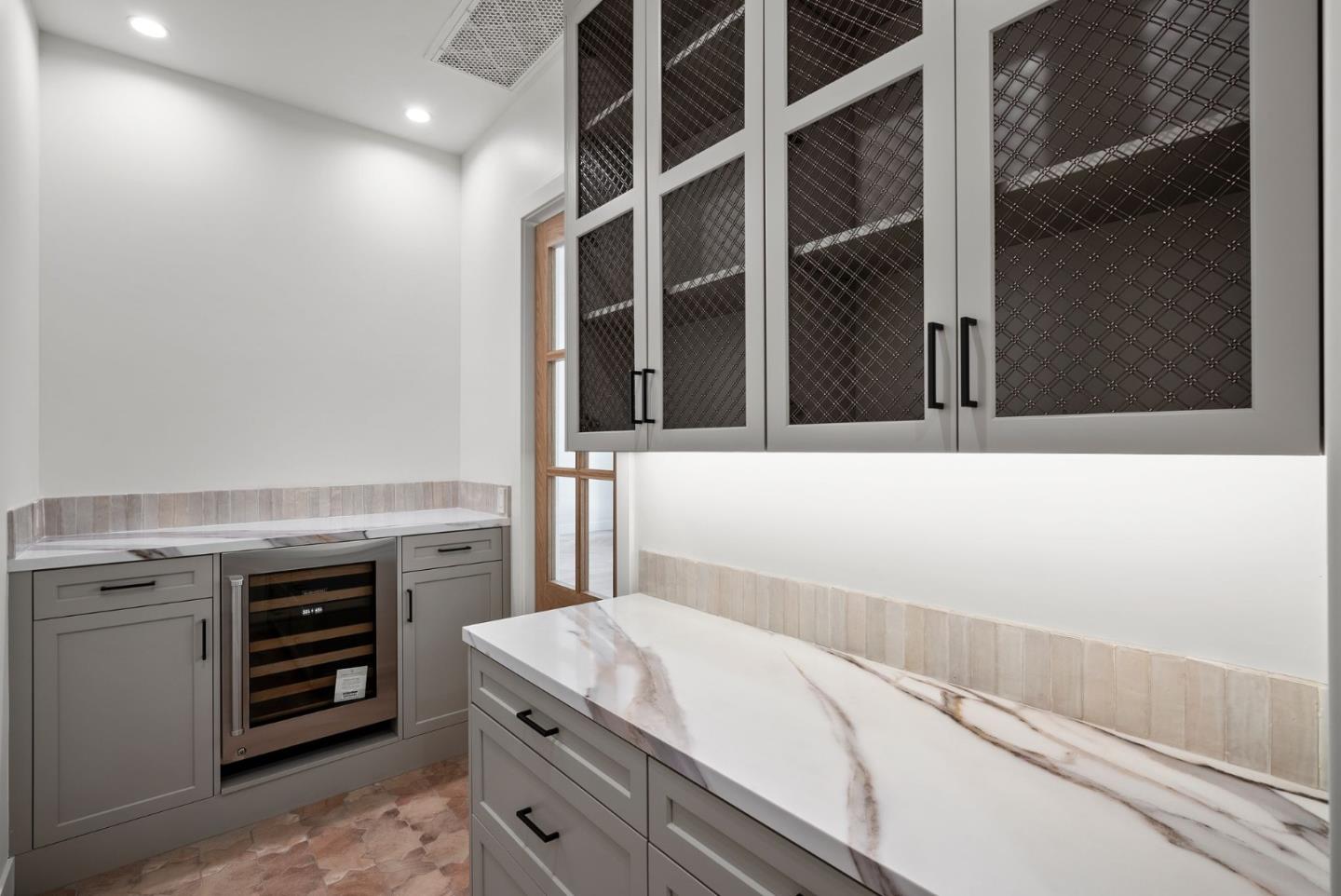 18521 Vessing Road Saratoga, CA 95070 - Photo 14 of 36 a bathroom with a sink and a mirror