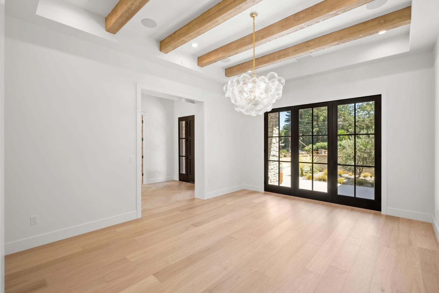 18521 Vessing Road Saratoga, CA 95070 - Photo 16 of 36 wooden floor in an empty room with a window