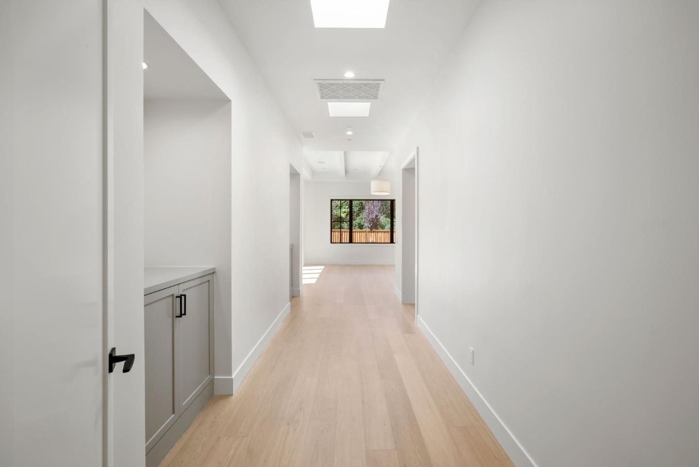 18521 Vessing Road Saratoga, CA 95070 - Photo 18 of 36 a view of a hallway with wooden floor
