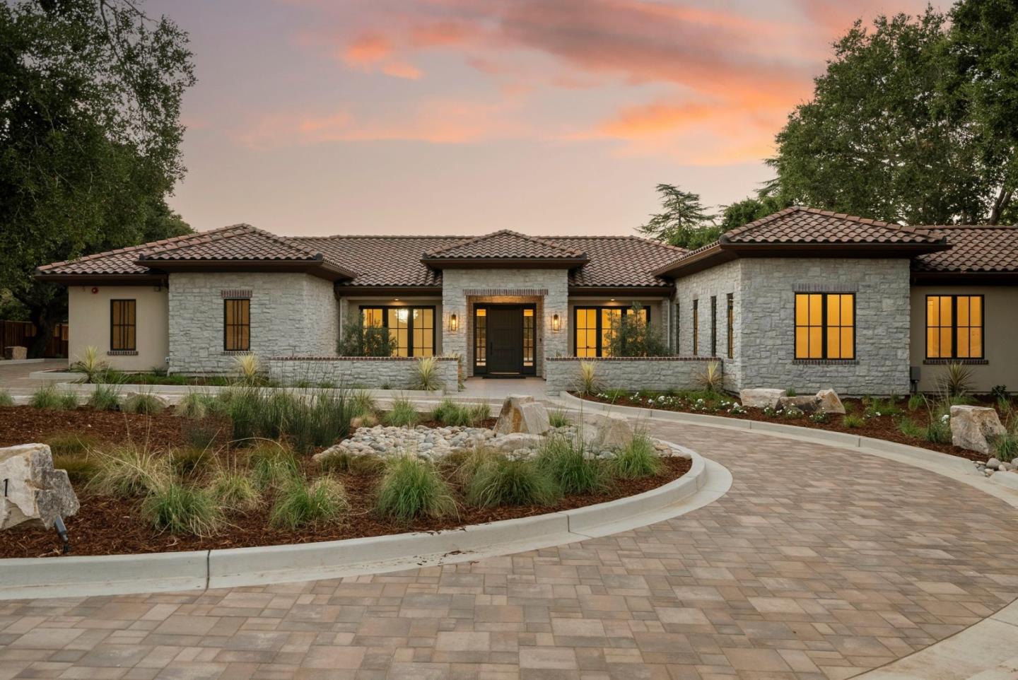 18521 Vessing Road Saratoga, CA 95070 - Photo 2 of 36 a front view of a house with a garden
