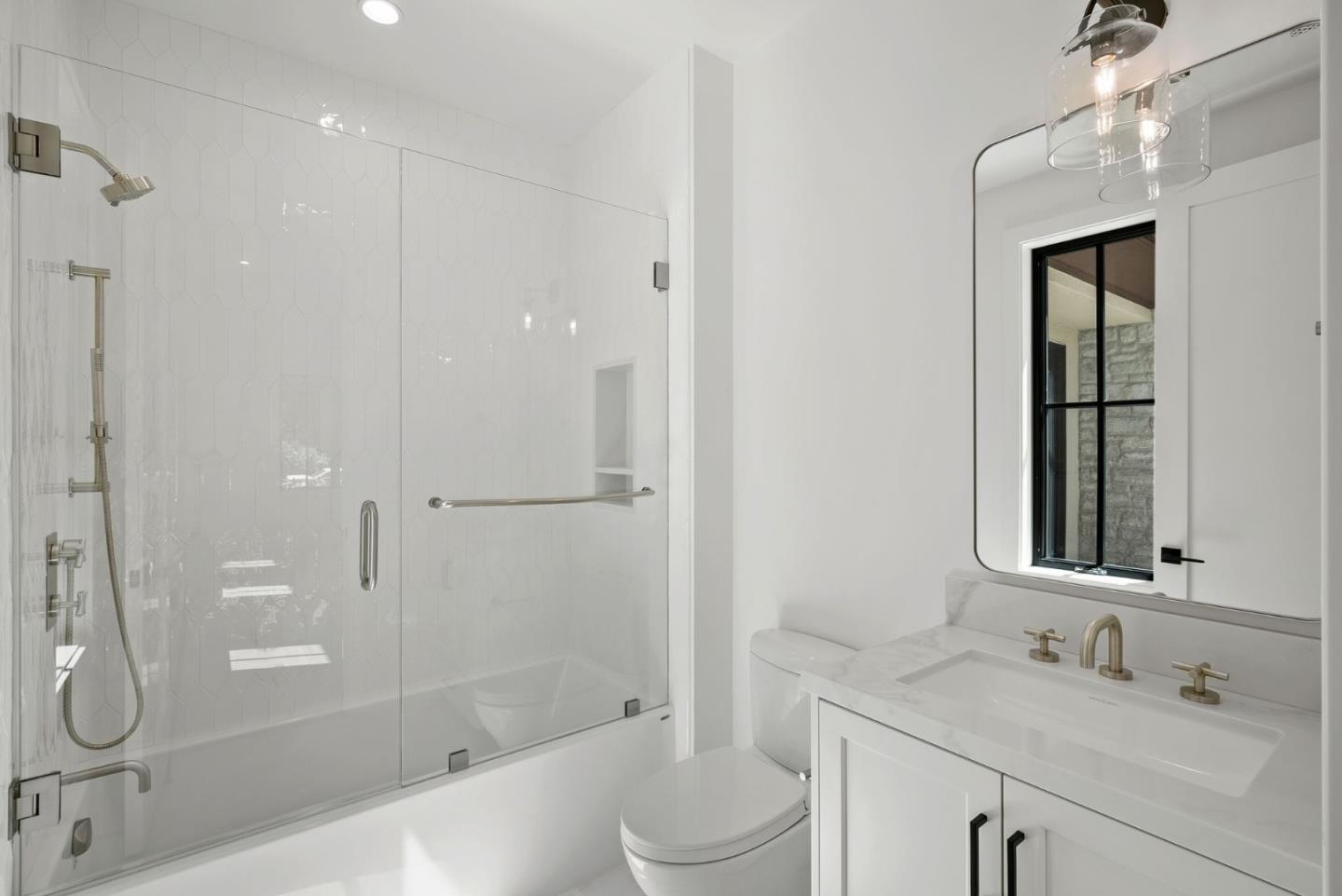 18521 Vessing Road Saratoga, CA 95070 - Photo 25 of 36 a bathroom with a sink a toilet and shower