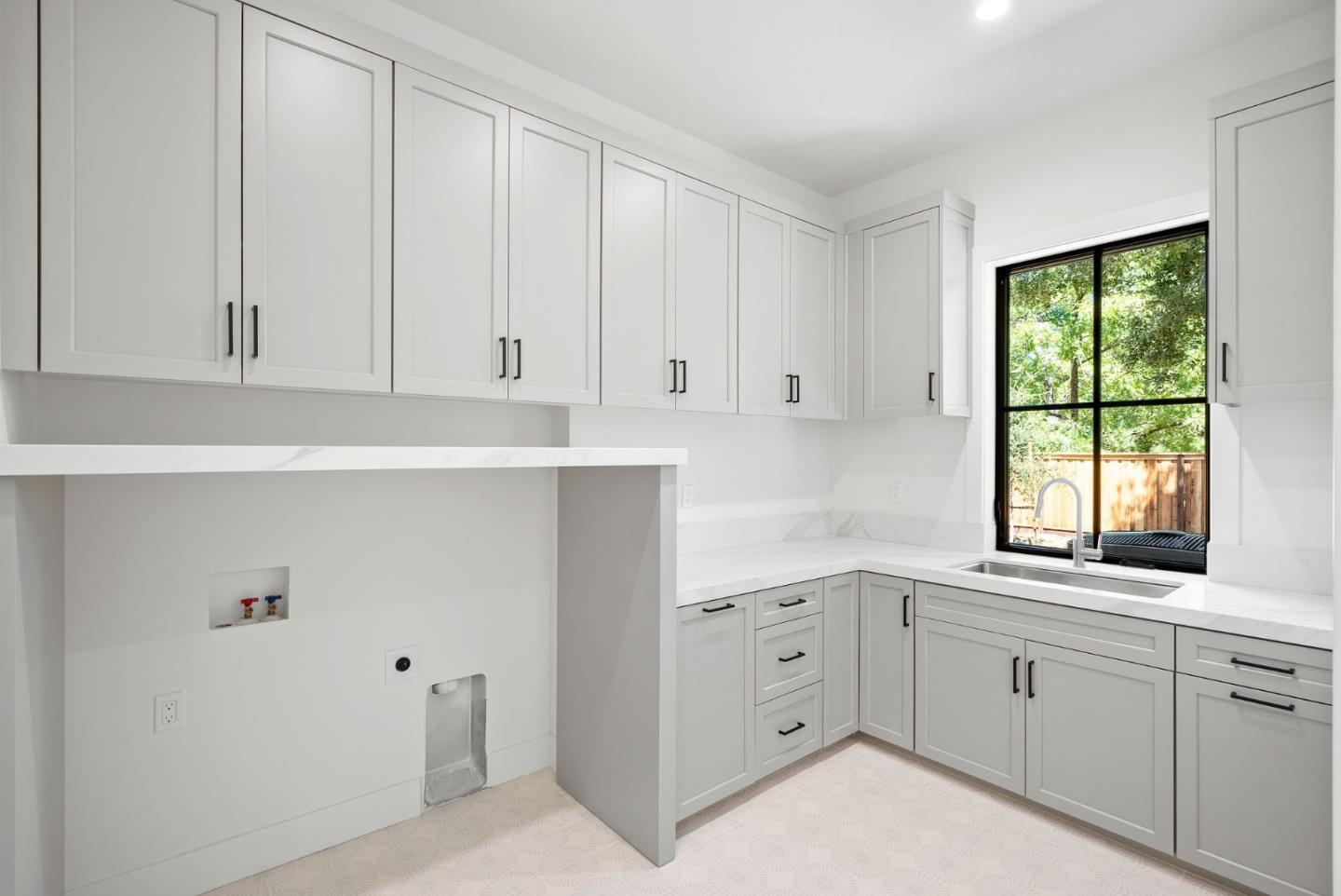 18521 Vessing Road Saratoga, CA 95070 - Photo 26 of 36 a kitchen with white cabinets and window