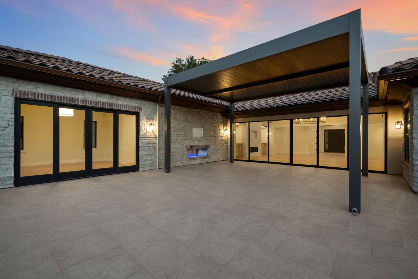 18521 Vessing Road Saratoga, CA 95070 - Photo 28 of 36 a big room with wooden floor and windows