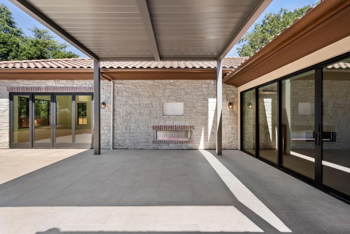 18521 Vessing Road Saratoga, CA 95070 - Photo 31 of 36 a living room with a large window