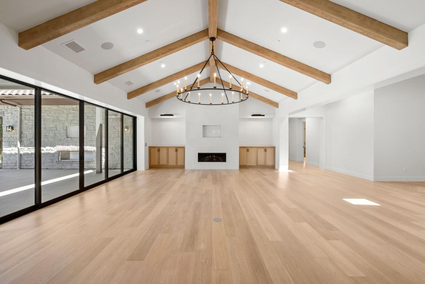 18521 Vessing Road Saratoga, CA 95070 - Photo 5 of 36 a view of an empty room with a chandelier