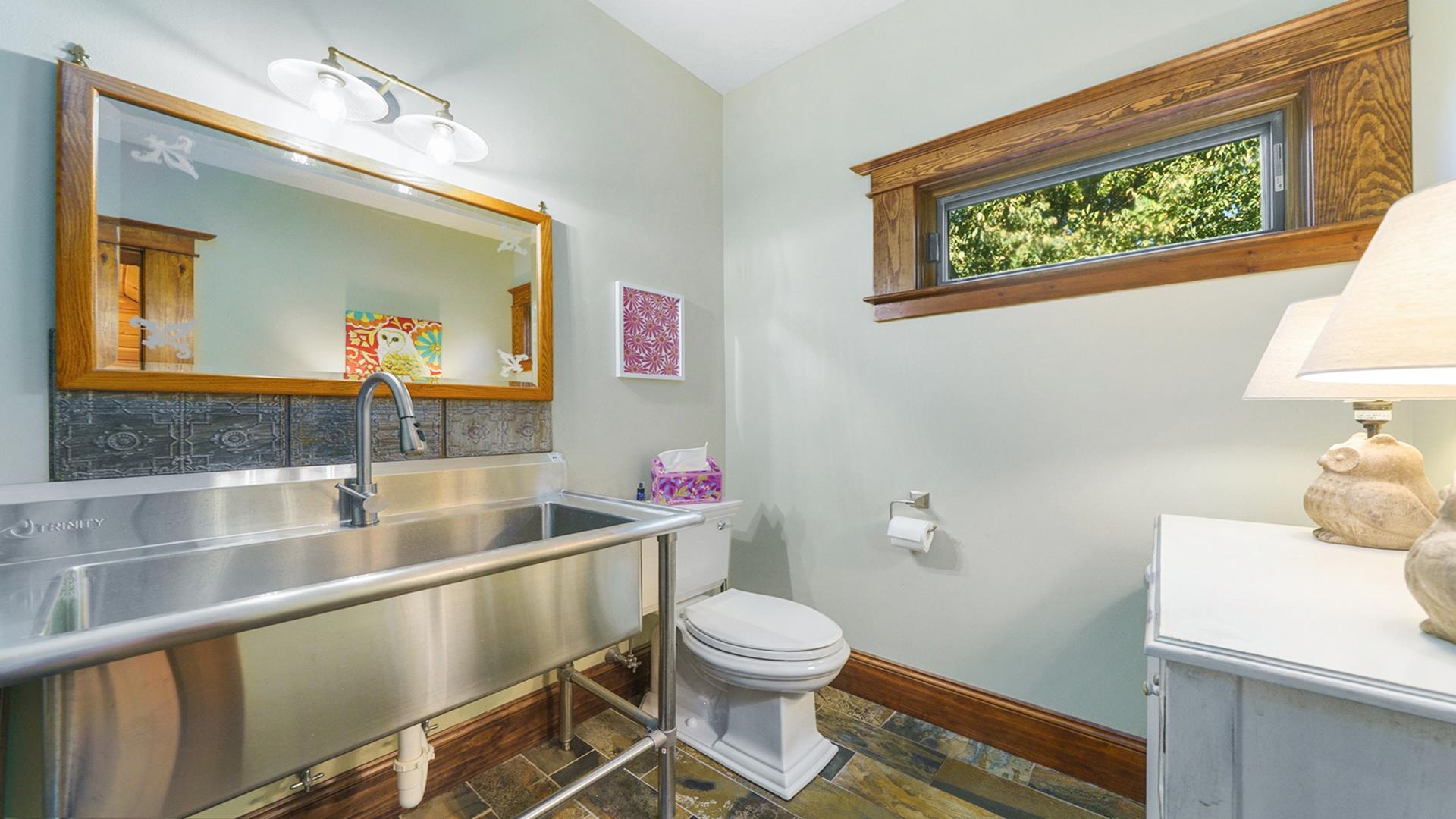 409 North State Street Franklin Grove, IL 61031 - Photo 35 of 98 a bathroom with a toilet sink and mirror