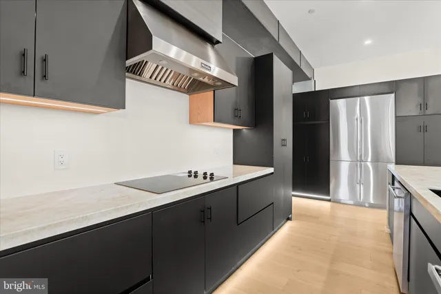 a view of a dining room with furniture and a window