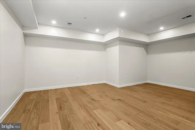 a black and white photo of a living room