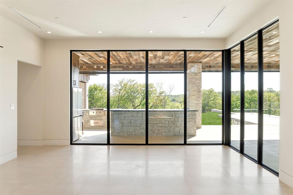 545 West Bob Jones Road Southlake, TX 76092 - Photo 18 of 40 a view of an empty room with large windows