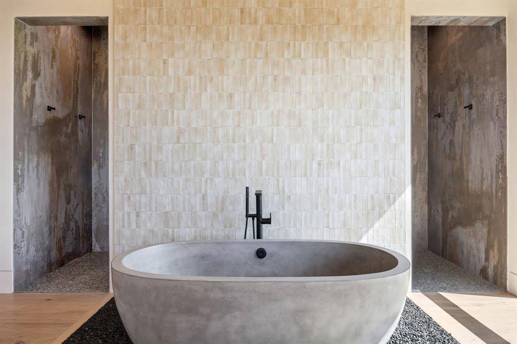 545 West Bob Jones Road Southlake, TX 76092 - Photo 32 of 40 a white bath tub sitting in a bathroom