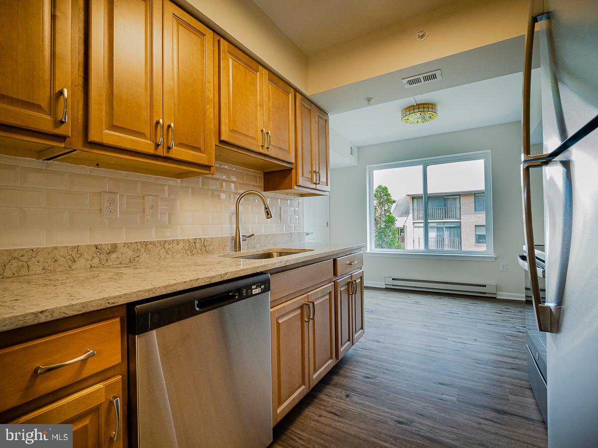 15210 Elkridge Way, Unit 912B Silver Spring, MD 20906 - Photo 9 of 27 All new kitchen with granite