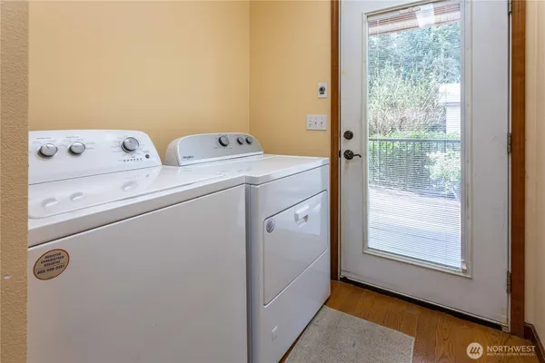 a utility room with dryer and washer