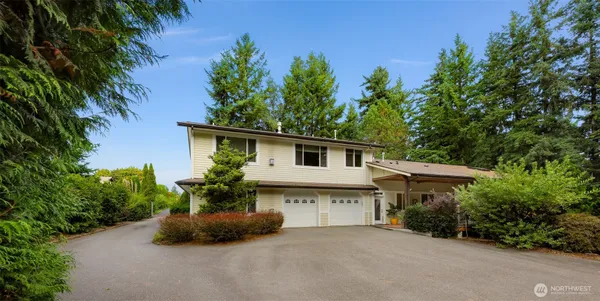 an outdoor view of house with green space