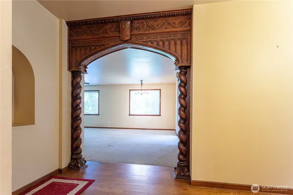 a view of entryway with wooden floor