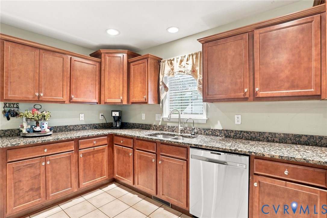 6401 Poplar Road Quinton, VA 23141 - Photo 8 of 46 Kitchen featuring extensive wood cabinetry, granit