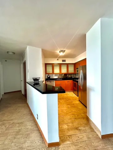 a view of a living room with furniture