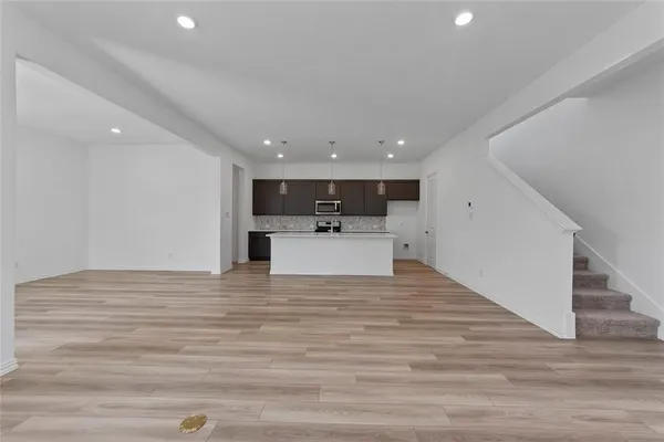 a view of kitchen with a sink