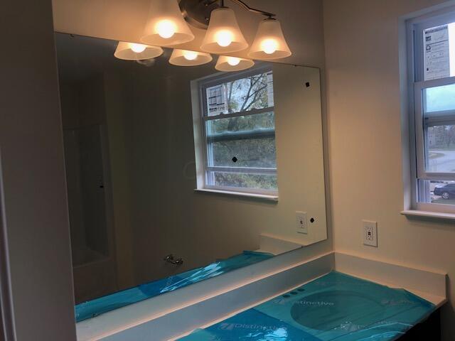 11 Thurber Road Ashville, OH 43103 - Photo 16 of 28 MASTER BATH w/QUARTZ COUNTERTOP, UNDERMOUNT BOWL SINK & LVP FLOORING