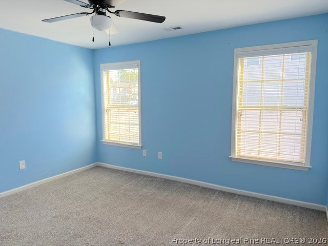144 Bicentennial Way Cameron, NC 28326 - Photo 15 of 23 a view of an empty room with a window