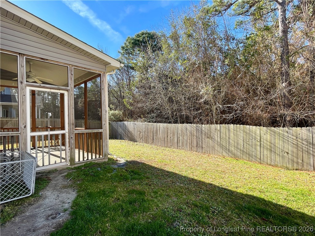 144 Bicentennial Way Cameron, NC 28326 - Photo 22 of 23 a view of backyard with a swimming pool and furniture