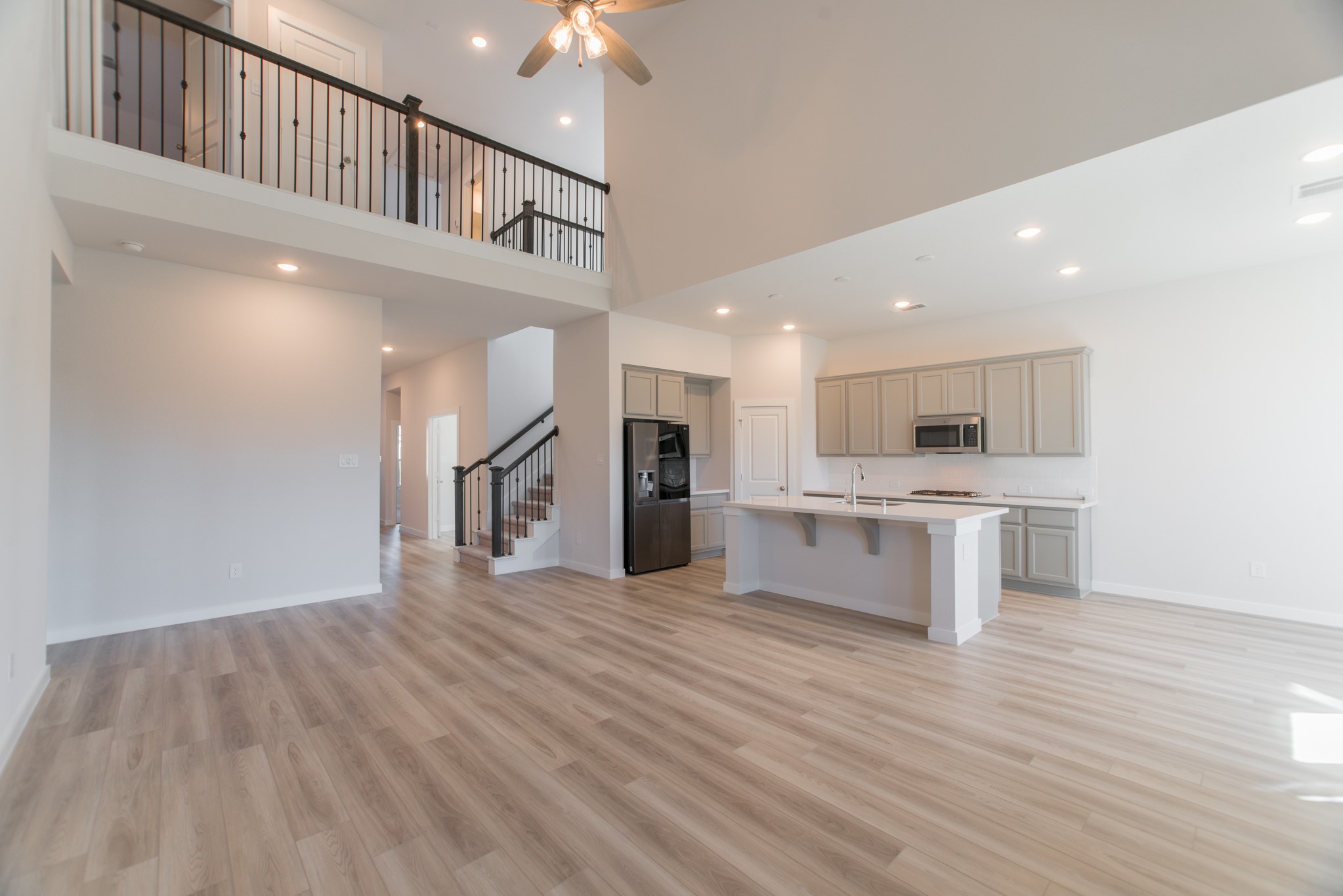 17138 Crimson Crest Drive Conroe, TX 77302 - Photo 12 of 50 a view of kitchen with cabinets and stainless steel appliances