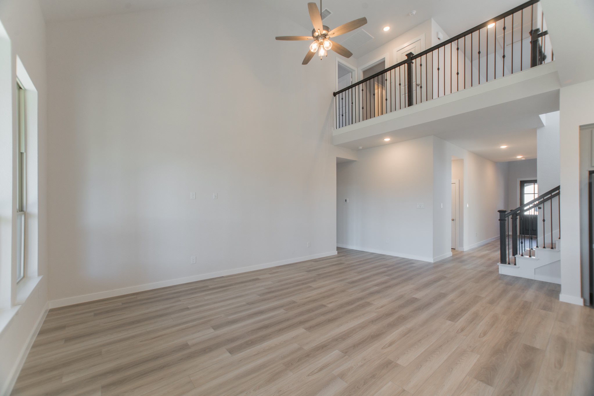 17138 Crimson Crest Drive Conroe, TX 77302 - Photo 14 of 50 a view of empty room with wooden floor