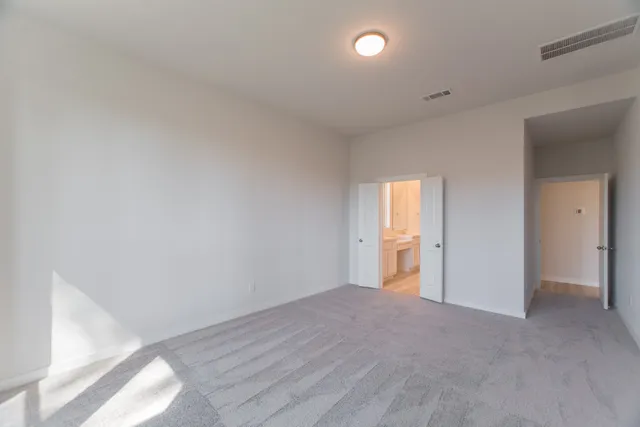 a bathroom with a granite countertop sink mirror and a bathtub
