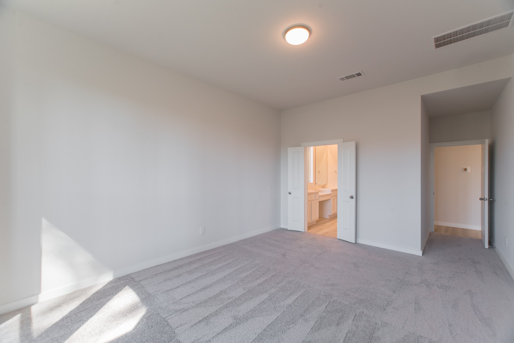 17138 Crimson Crest Drive Conroe, TX 77302 - Photo 22 of 50 a view of an empty room and a window