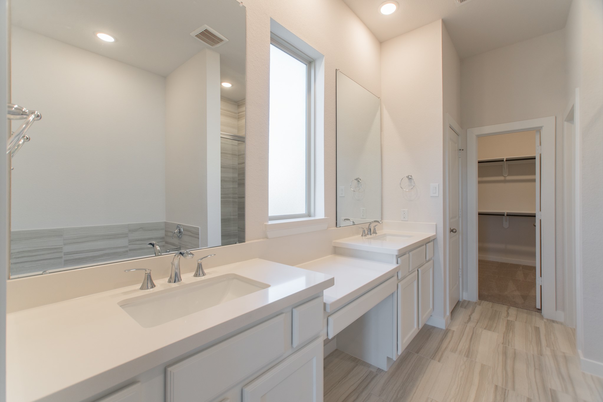 17138 Crimson Crest Drive Conroe, TX 77302 - Photo 24 of 50 a bathroom with a double vanity sink mirror and