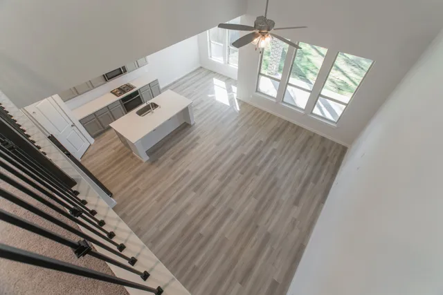 a view of empty room with windows