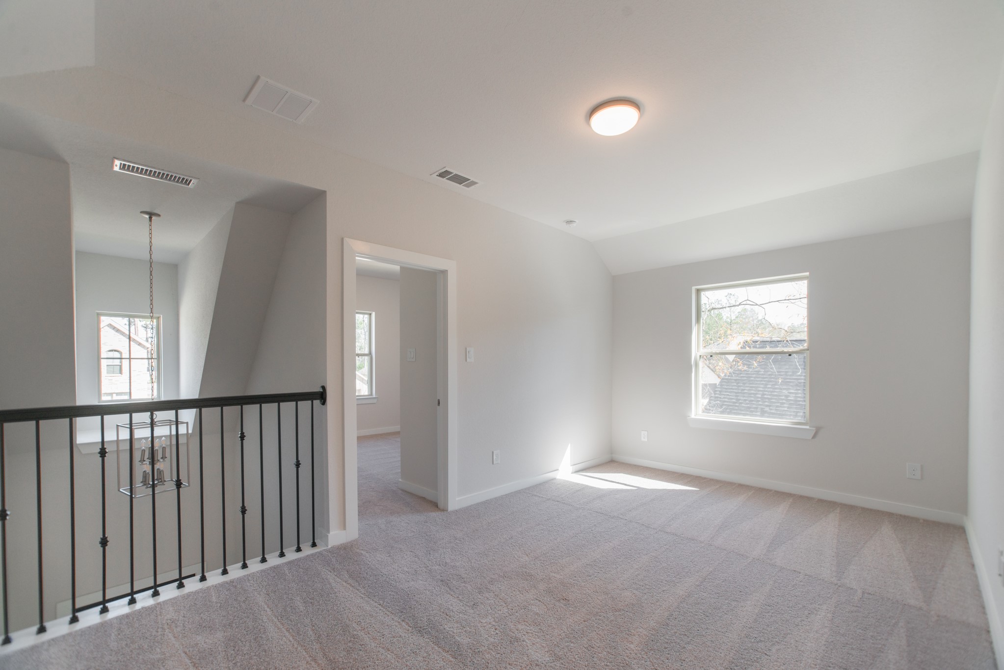 17138 Crimson Crest Drive Conroe, TX 77302 - Photo 32 of 50 a view of empty room with windows