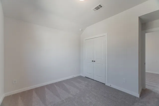 a bathroom with a sink double vanity granite tub shower and a mirror