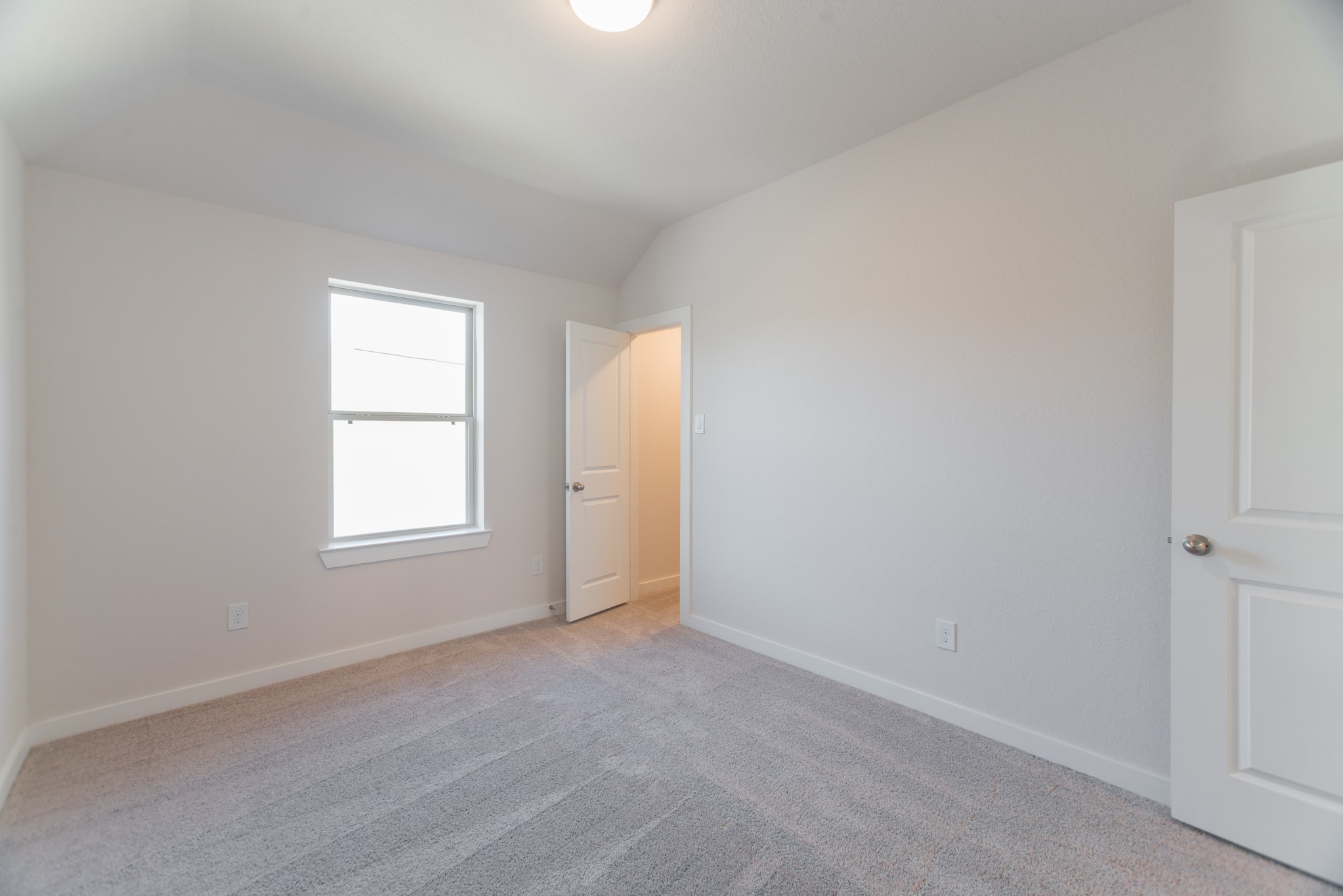 17138 Crimson Crest Drive Conroe, TX 77302 - Photo 36 of 50 an empty room with windows