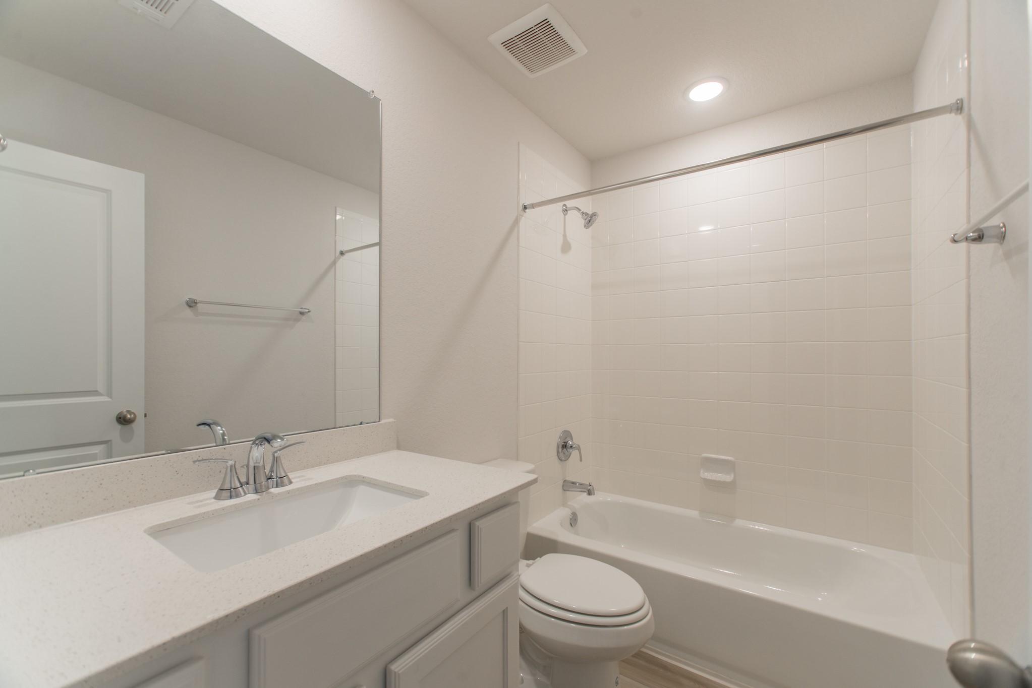 17138 Crimson Crest Drive Conroe, TX 77302 - Photo 38 of 50 a bathroom with a bathtub shower sink vanity mirror and toilet